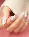 Beyondcanva press-on nails featuring colorful stained glass details and a glossy finish, adding elegance to any look.