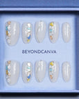 Beyondcanva press-on nails featuring colorful stained glass details and a glossy finish, adding elegance to any look.