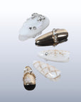 BEYONDCANVA Winter Elegance nail set featuring a pearl necklace design, sparkling snowflake accents, and an elegant bow, combining festive charm with sophisticated style—perfect for any winter gathering.