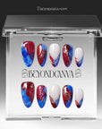 Clear packaging box displaying press-on nails with blue, red, and white abstract swirl designs.