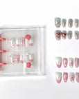 Beyondcanva Nail Collector Book beside three coordinated press-on nail sets in a white background capacity display