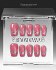 Candy Spark pink press-on nails displayed in a clear packaging box