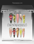 Press-on nails displayed in a clear BeyondCanva case with multicolor floral designs and pastel accent nails.