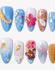 Island Echo blue, white and coral press-on nails with tropical flowers, shells, starfish and sea turtle details