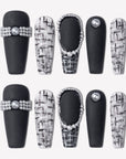 Lace & Pearls press-on nails with black matte tips, black and white lace pattern accents, and pearl rhinestone details