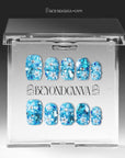 Packaging display of Ocean Sparkle Bloom handmade press-on nails inside a clear box with BEYONDCANVA branding.