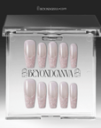 Packaging display of Pink Confetti press-on nails with sheer nude pink bases and sparkling pink silver glitter French tips in a clear BeyondCanva case