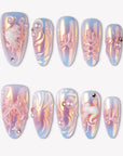 Swan Ballet iridescent blue and pink press-on nails with pearl accents, bows and white swan details