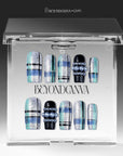 Winter Gridlight press-on nails displayed in a clear BeyondCanva case with silver glitter, aqua blue, black, and pearl accents