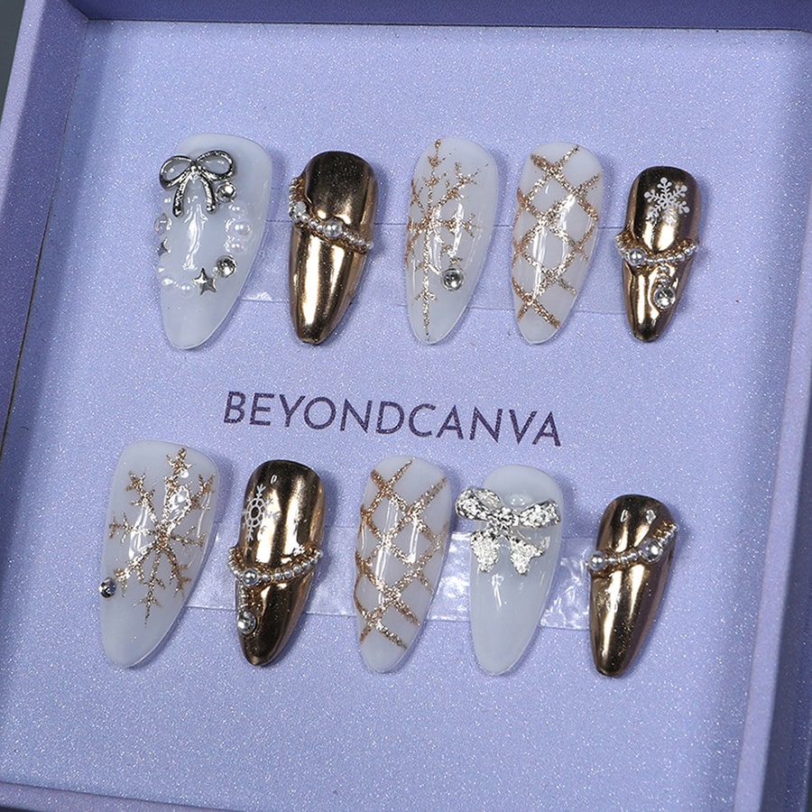 BEYONDCANVA Winter Elegance nail set featuring a pearl necklace design, sparkling snowflake accents, and an elegant bow, combining festive charm with sophisticated style—perfect for any winter gathering.