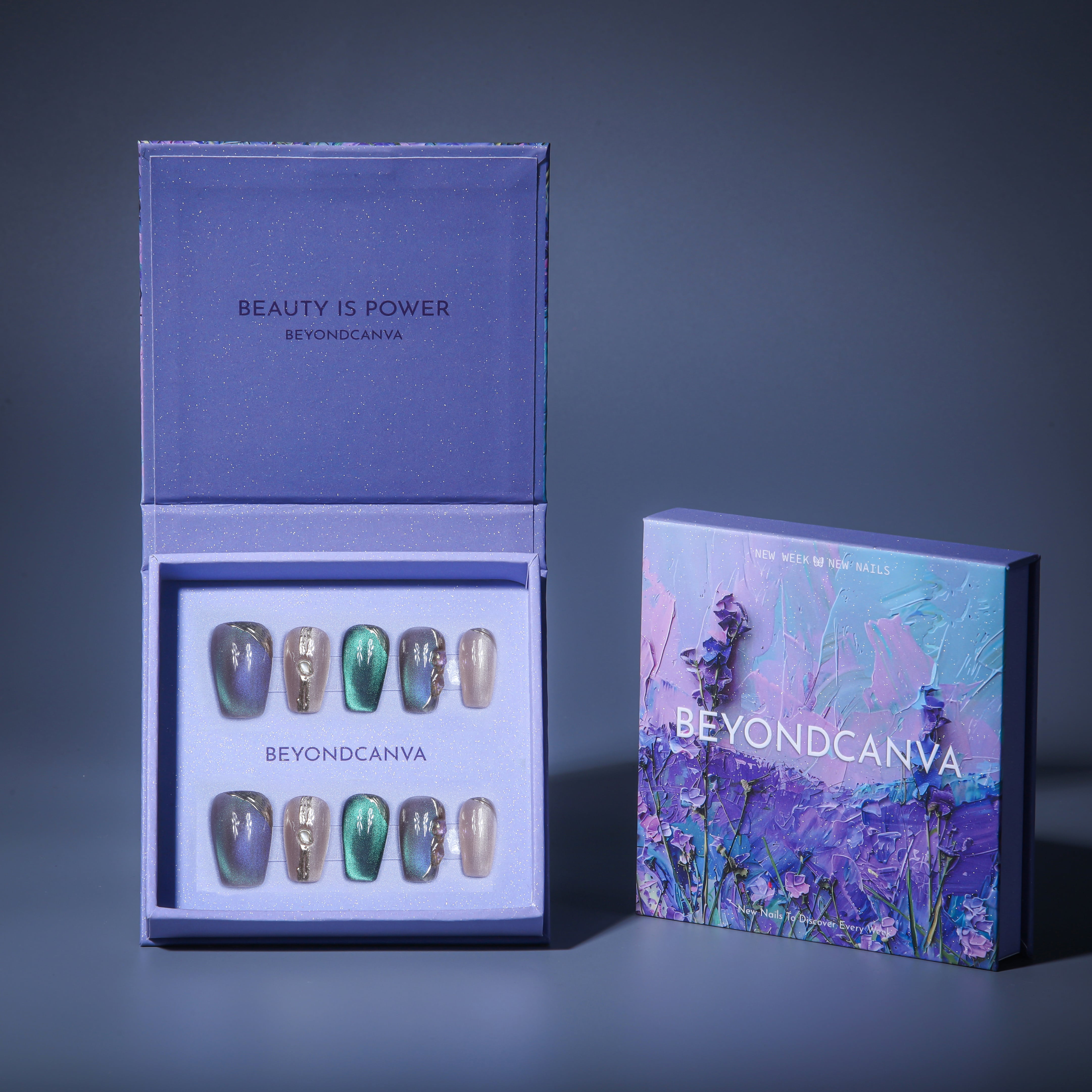 beyondcanva press-on nails in an iridescent purple and green design, adorned with pearl-like accents and textured details.