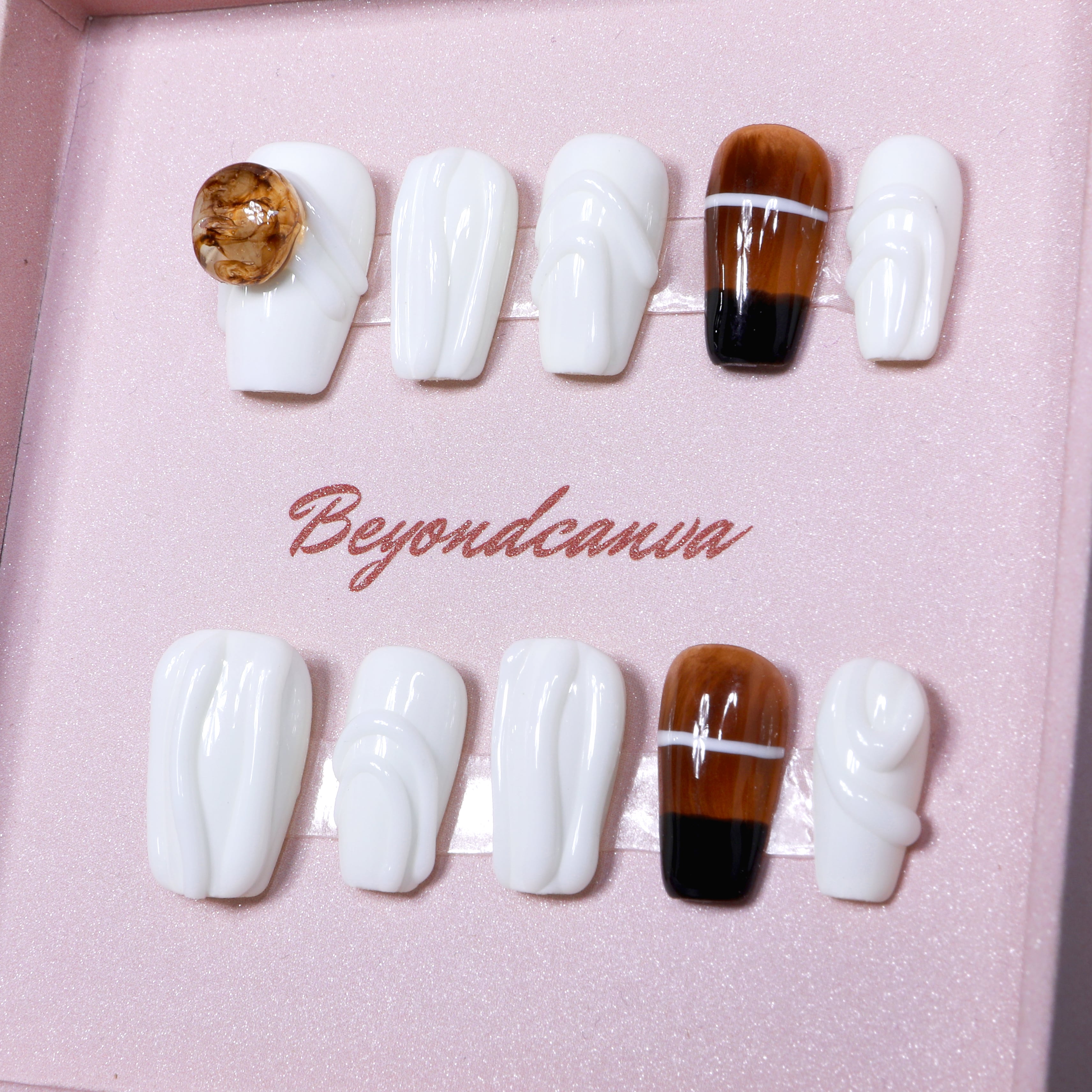 Beyondcanva elegant press-on nails with white swirls and amber accent, featuring minimalist design and premium finish for a chic look.