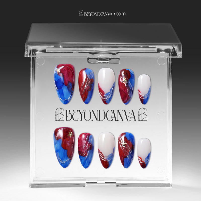 Clear packaging box displaying press-on nails with blue, red, and white abstract swirl designs.