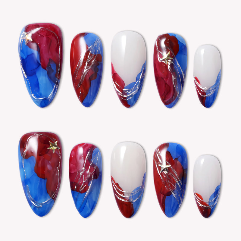 Set of press-on nails with blue, red, and white abstract swirls on a white background.