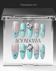 Aqua Bijou press-on nails displayed in a clear BeyondCanva case with mint blue and ivory tones, pearl accents, and crystal embellishments