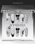 Atelier Hydrangeas press-on nails displayed in a clear BeyondCanva case with black and white floral accents, bows, and polka dots