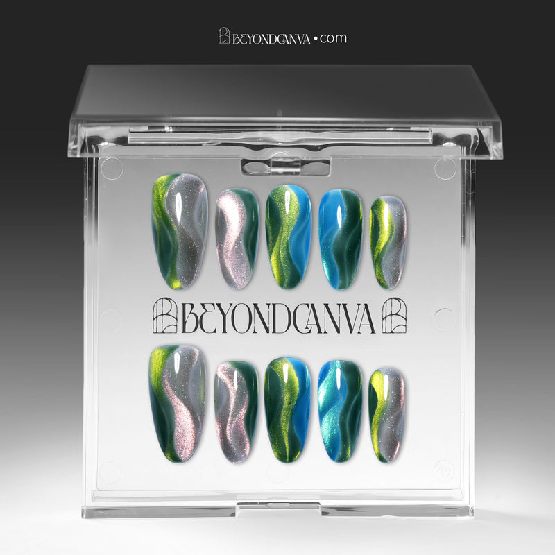 Green blue chrome press-on nails arranged in a flat lay