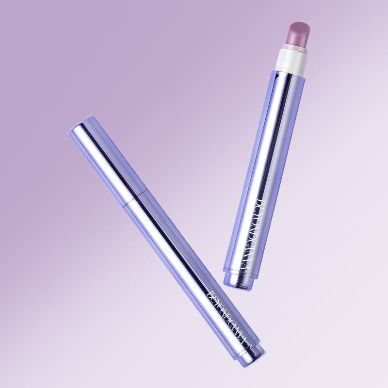 Close-up product image of the Beyondcanva Total Repair Nail Pen with purple metallic casing, cap, and exposed pink ceramic precision tip