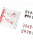 Transparent Beyondcanva Nail Collector Book shown with green, pink and iridescent press-on nail sets on white