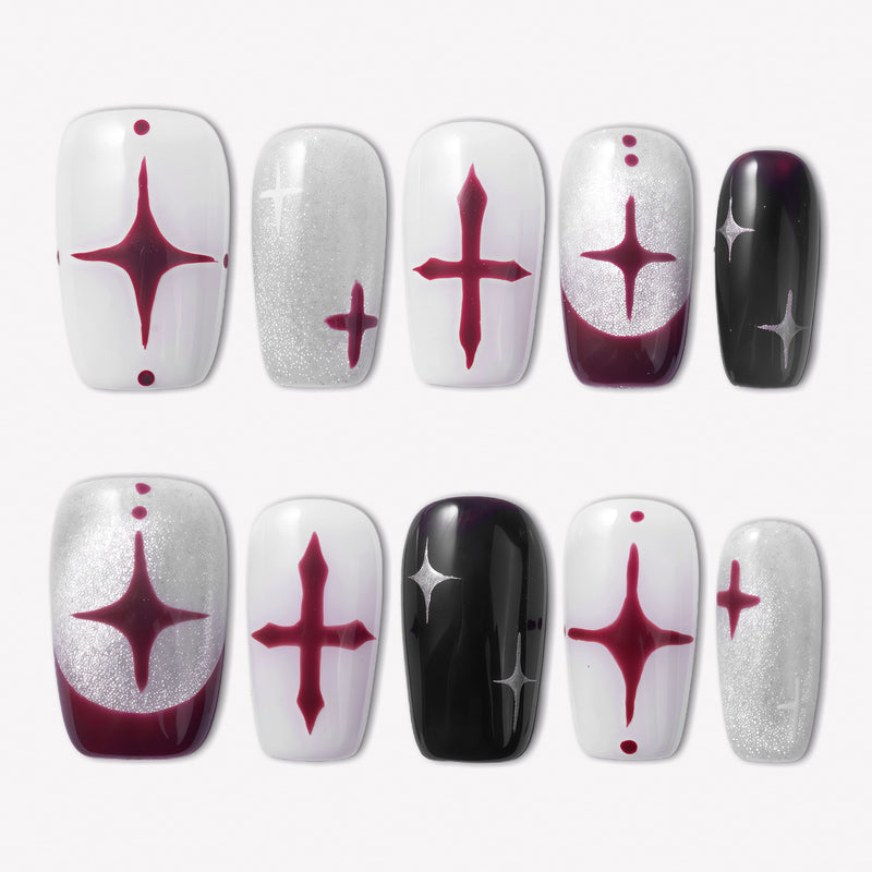 Blood Moon Cross press-on nails with black, white, silver glitter, and burgundy designs, featuring cross starburst accents, curved moon tips, and glossy square shapes