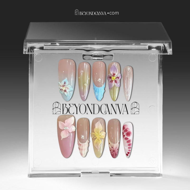 Press-on nails displayed in a clear BeyondCanva case with multicolor floral designs and pastel accent nails.