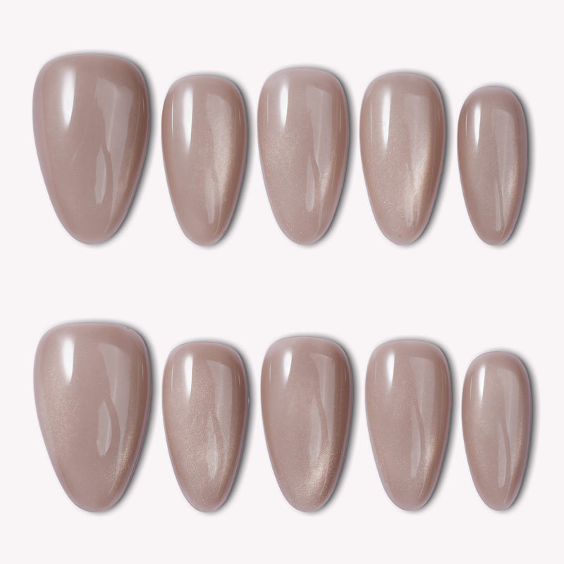 Classic Daily Set press-on nails shown as a flat lay of glossy taupe almond-shaped nails on a white background