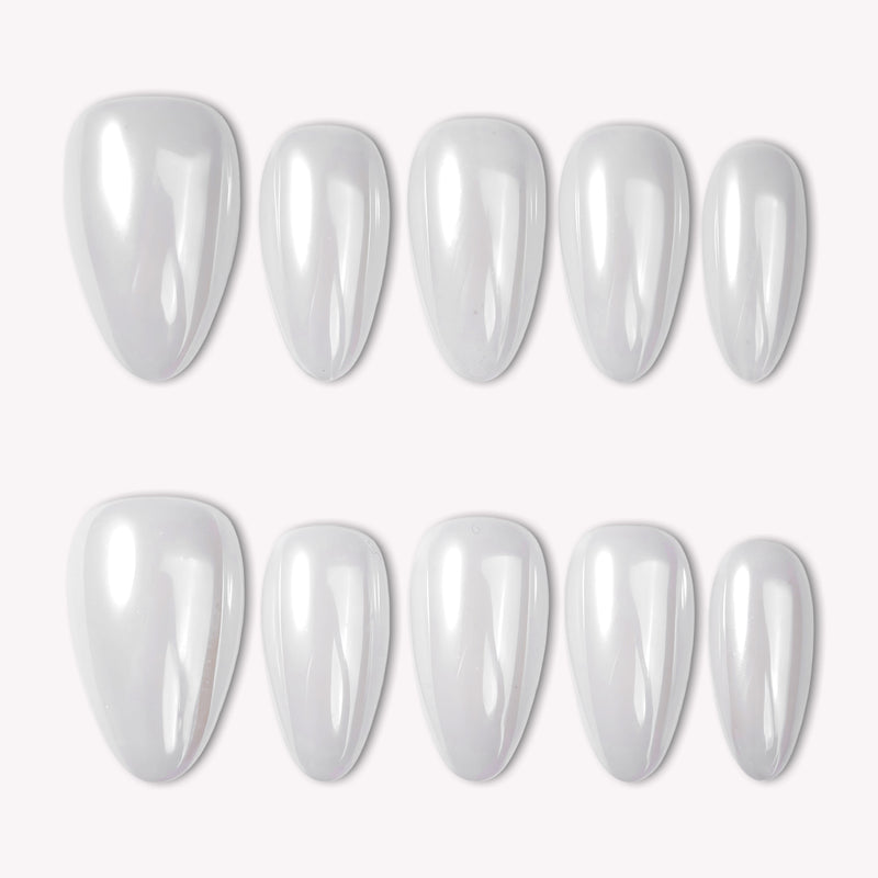 Classic Daily Set press-on nails shown as a flat lay of glossy white almond-shaped nails on a white background