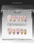 Crystal Dew handmade press on nails displayed in a clear acrylic case with branded packaging and a neutral backing card