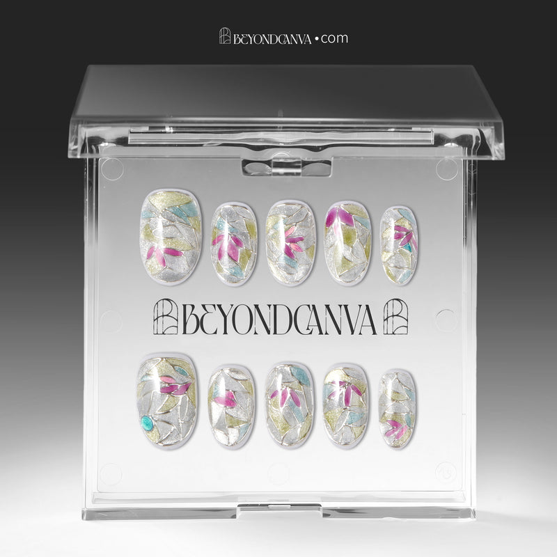 Crystal Leaves silver iridescent press-on nail set arranged inside a clear Beyondcanva display case