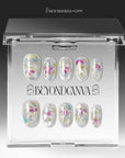 Crystal Leaves silver iridescent press-on nail set arranged inside a clear Beyondcanva display case