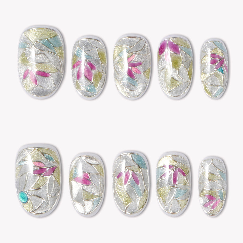Crystal Leaves silver iridescent press-on nails with pink, blue and green leaf mosaic details