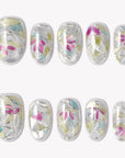 Crystal Leaves silver iridescent press-on nails with pink, blue and green leaf mosaic details