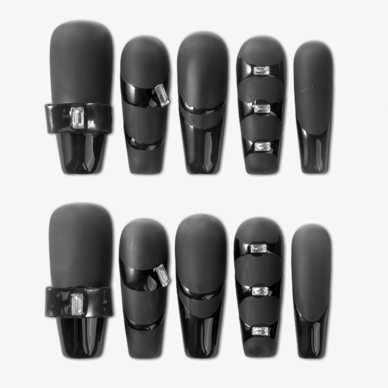 Eclipse Luxe press-on nails with black matte and glossy panel design, rectangular rhinestone accents, and sleek dark finish