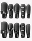 Eclipse Luxe press-on nails with black matte and glossy panel design, rectangular rhinestone accents, and sleek dark finish