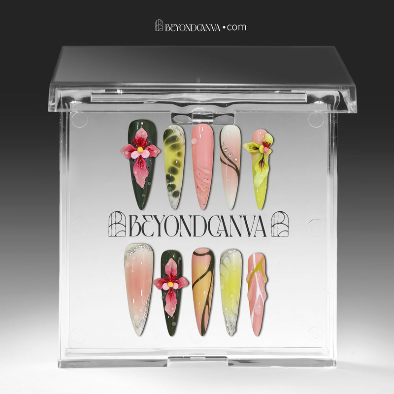 Press-on nails displayed in a clear BeyondCanva case with multicolor floral designs and pastel accent nails.