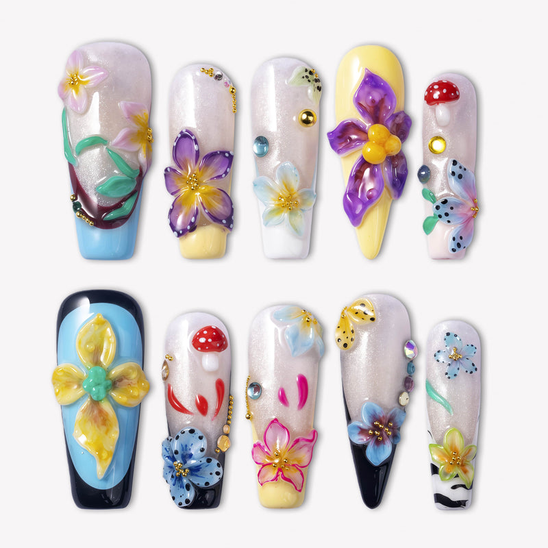 Floral Symphony press-on nails with 3D flowers, mushroom accents, rhinestones, and colorful glossy tips