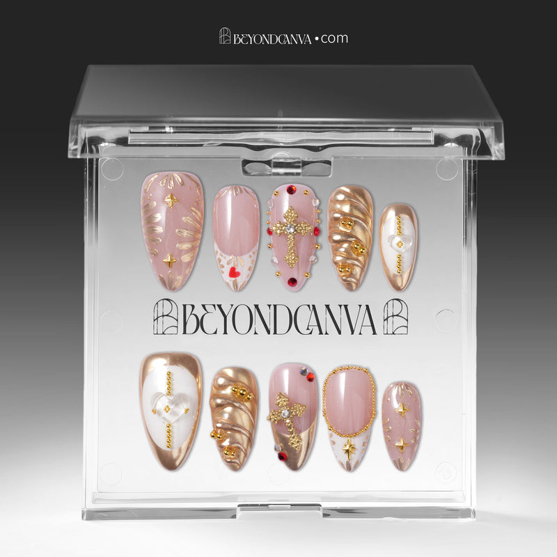 Clear BeyondCanva box displaying blush pink and gold jeweled press-on nails.