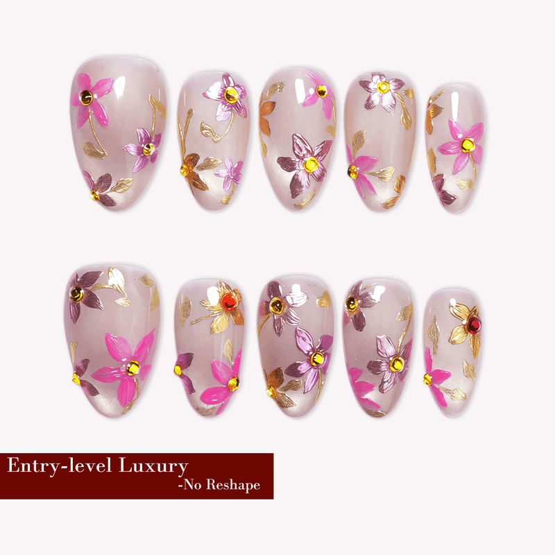 Golden Meadow pink floral cat-eye press-on nails arranged in a flat lay on a white background