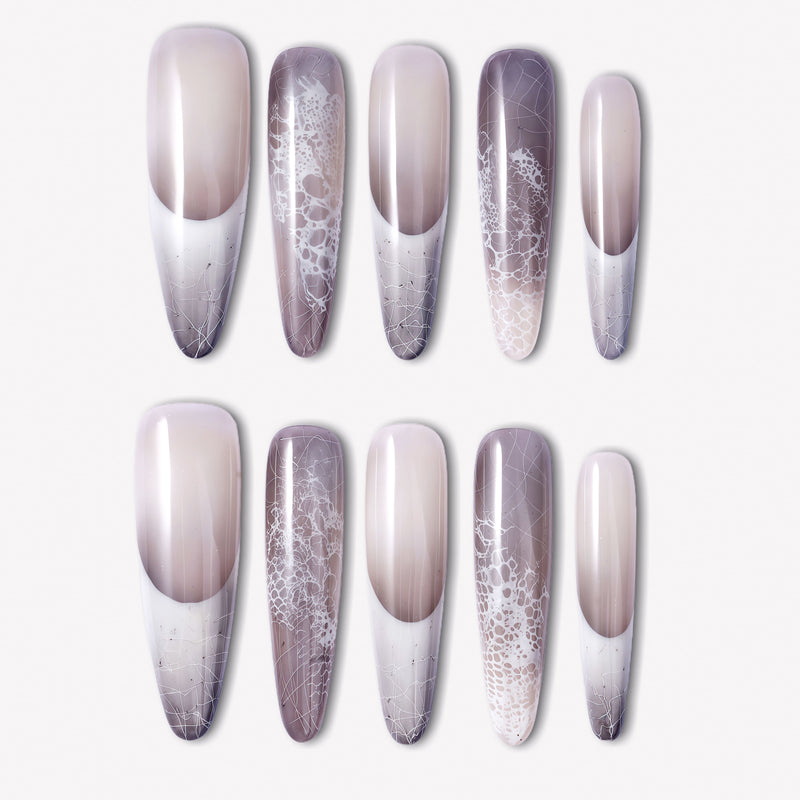 Himalayan Mist press-on nails with gray lilac mist gradient, white French tips, silver crackle linework, and delicate lace-like texture