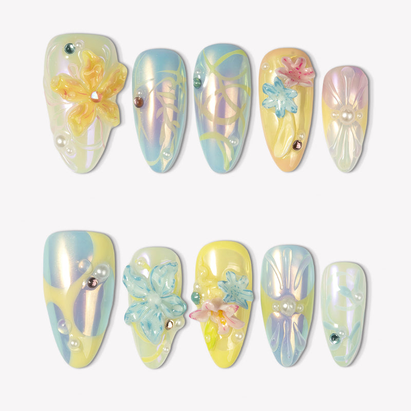 Iridescent Petals pastel yellow, blue and green press-on nails with raised flowers, pearls and gem accents