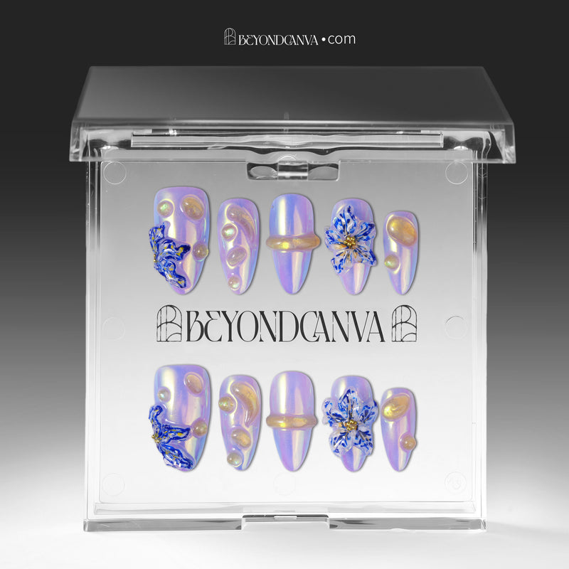 Iris Bloom iridescent purple floral press-on nails arranged inside a clear Beyondcanva display case