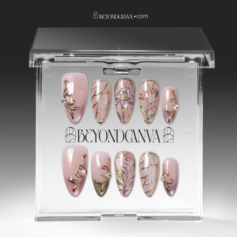 Clear BeyondCanva box displaying blush pink and gold floral press-on nails with stained-glass line art.