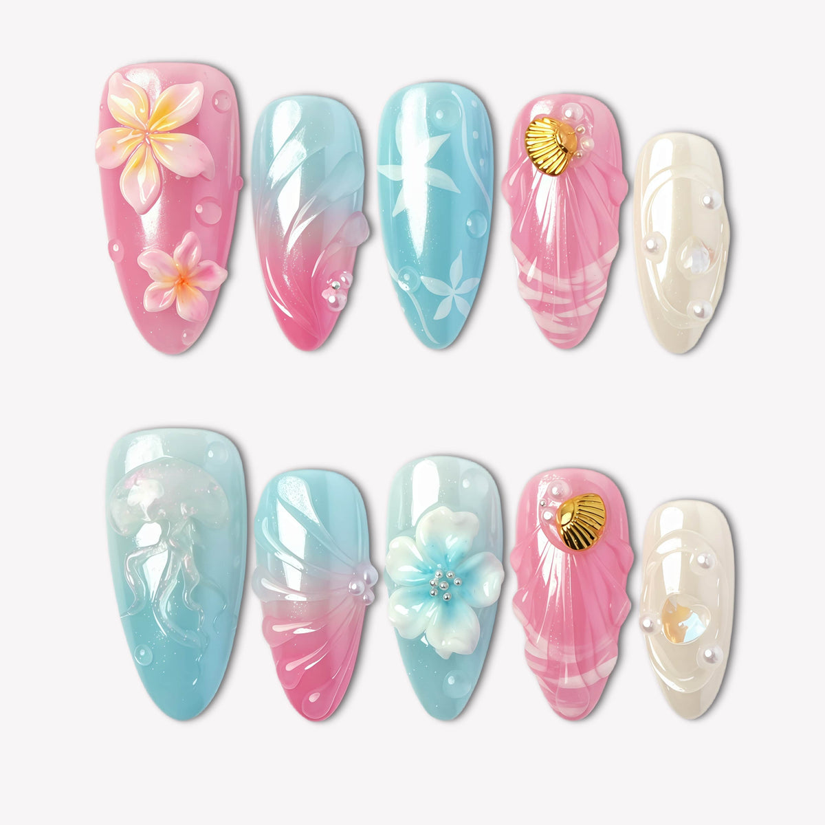 Mermaid Mood pink and blue press-on nails with shells, flowers, pearls and water drop details