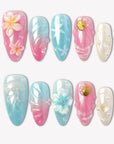 Mermaid Mood pink and blue press-on nails with shells, flowers, pearls and water drop details