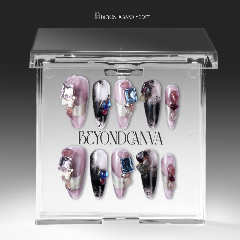 Mineral Dreamscape press-on nails displayed in a clear BeyondCanva case with lilac, black, silver, and gemstone accents