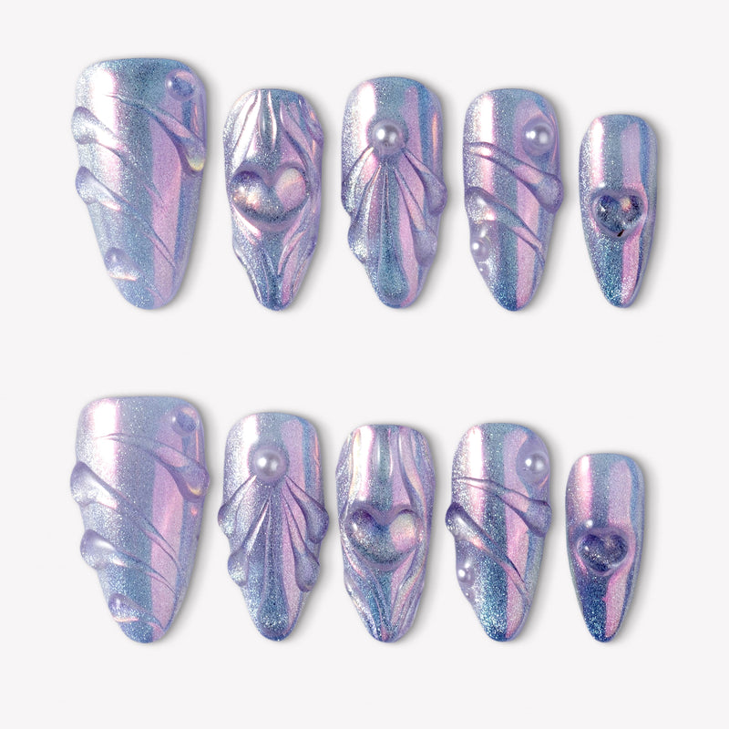Moonwave blue and purple iridescent press-on nails with pearl accents and raised wave details
