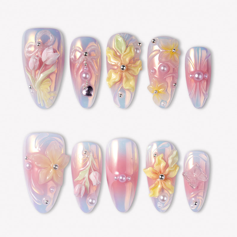 Pastel Bloom pink and blue press-on nails with raised yellow flowers, pearls and silver bead accents