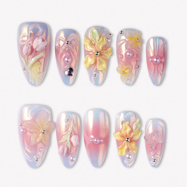 Pastel Bloom pink and blue press-on nails with raised yellow flowers, pearls and silver bead accents