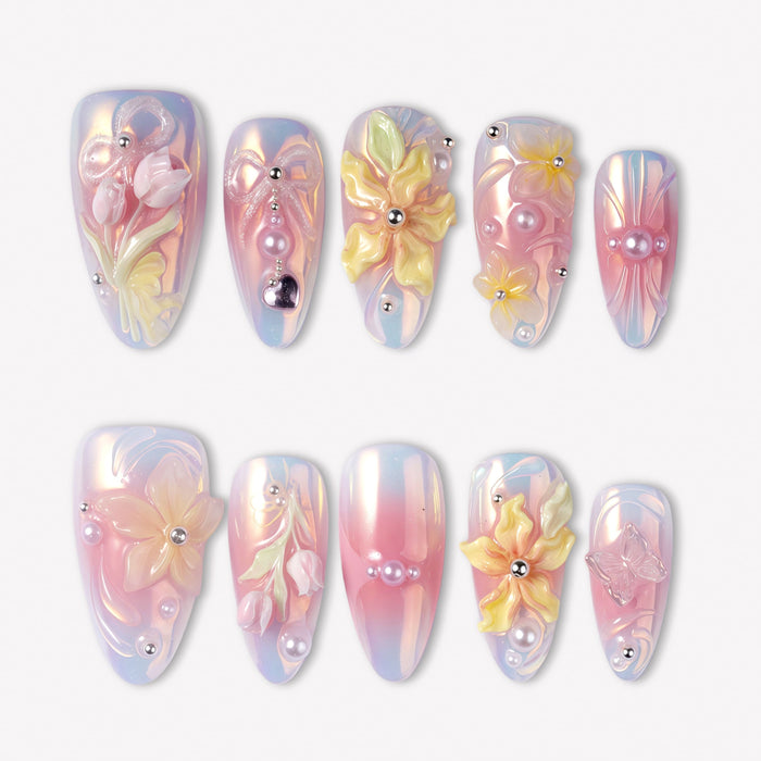 Pastel Bloom pink and blue press-on nails with raised yellow flowers, pearls and silver bead accents