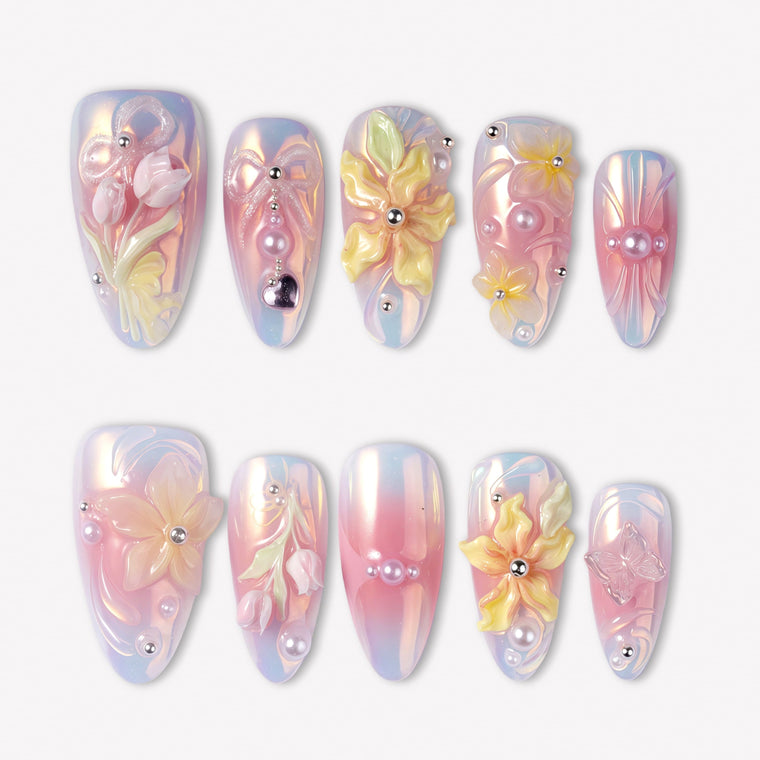 Pastel Bloom pink and blue press-on nails with raised yellow flowers, pearls and silver bead accents
